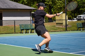 Image of a Playtester hitting a Forehand