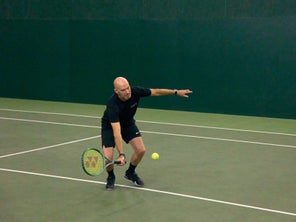 Image of Playtester Hitting a Forehand Volley