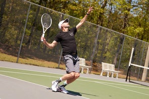 image of Playtester hitting a serve